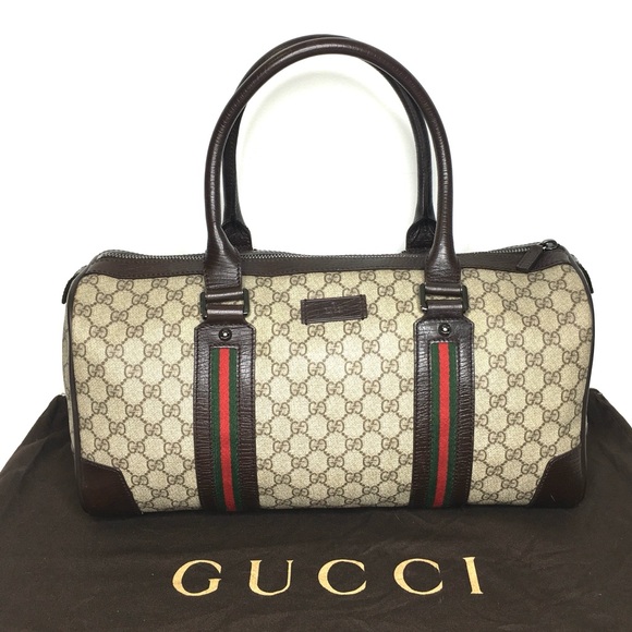 Gucci Handbags - Gucci authentic brown monogram coated canvas unisex travel bag